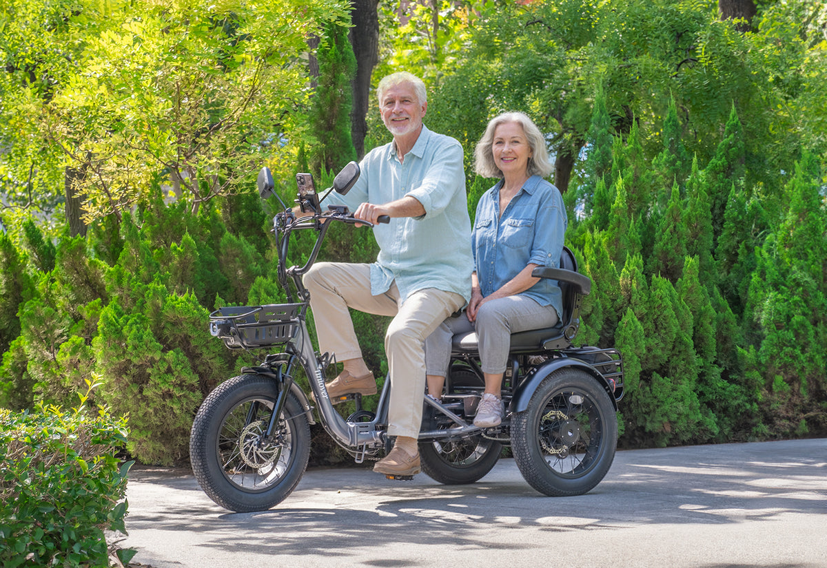 Tiniover Creek Pro electric trike with Passenger Seat Kit carrying two older adult riders