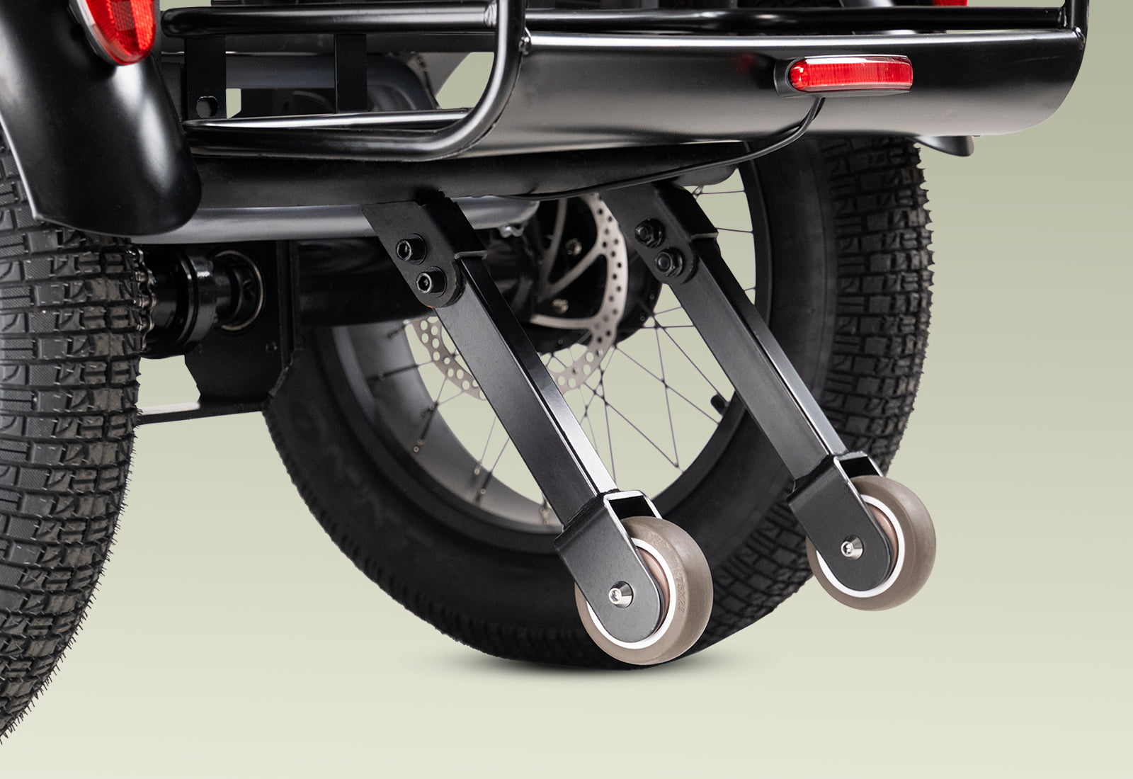 Tiniover Creek electric tricycle with rear anti-tip support wheels that enhance stability and prevent backward flipping on slopes